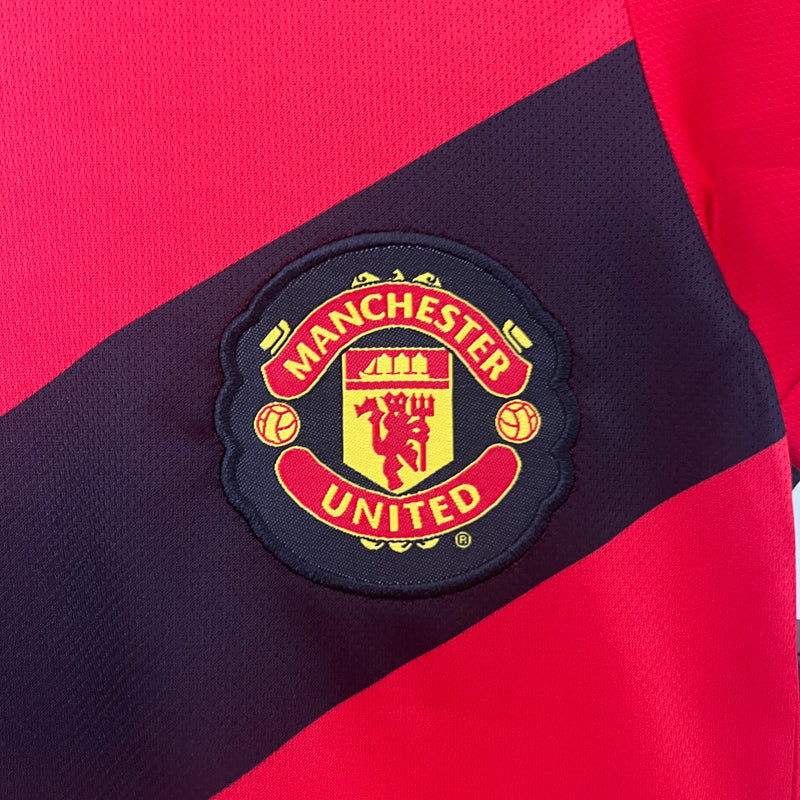 Conjunto Manchester United I 09/10 - Modelo Infantil